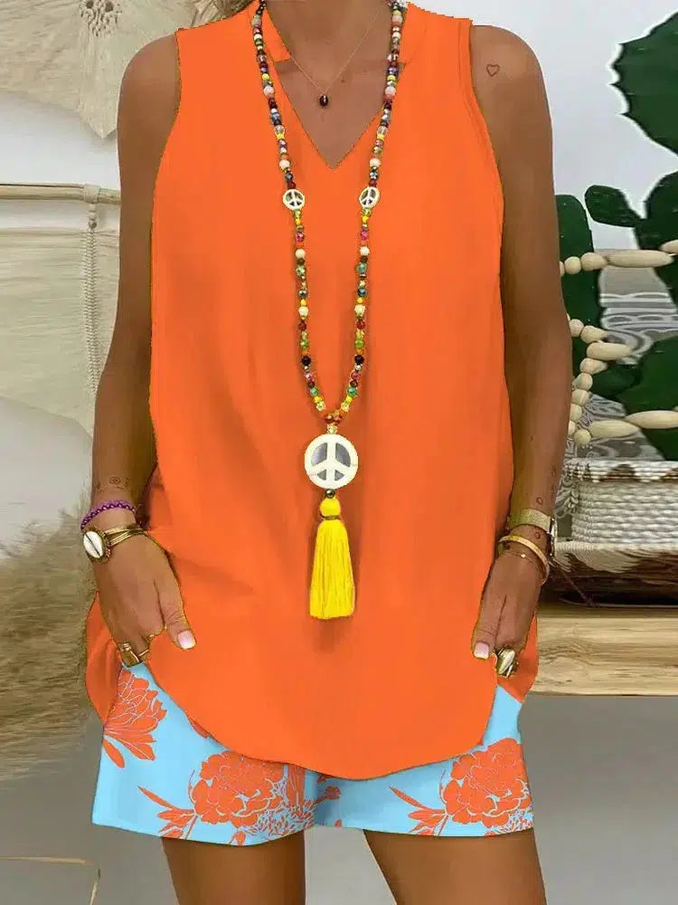 Zweiteiliges Set mit ärmellosem Druck in Orange