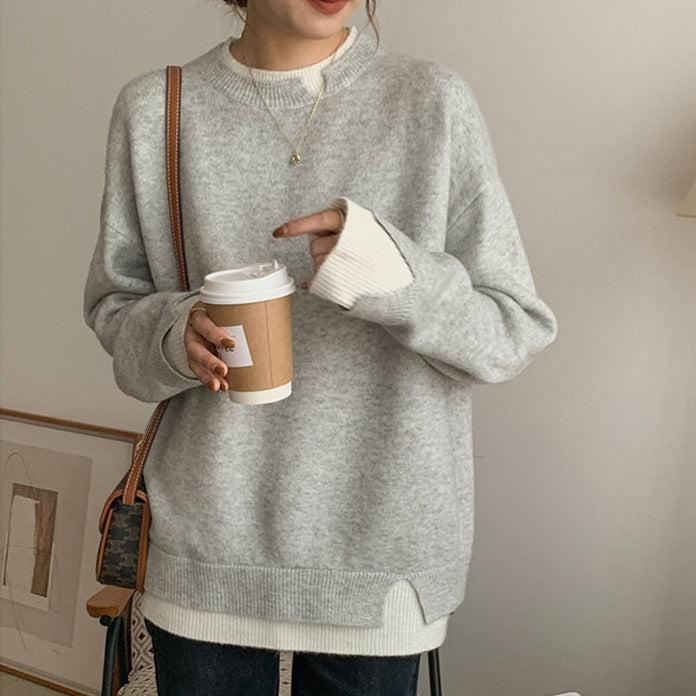 Grauer und weißer übergroßer Pullover mit langen Ärmeln und Cut-Out